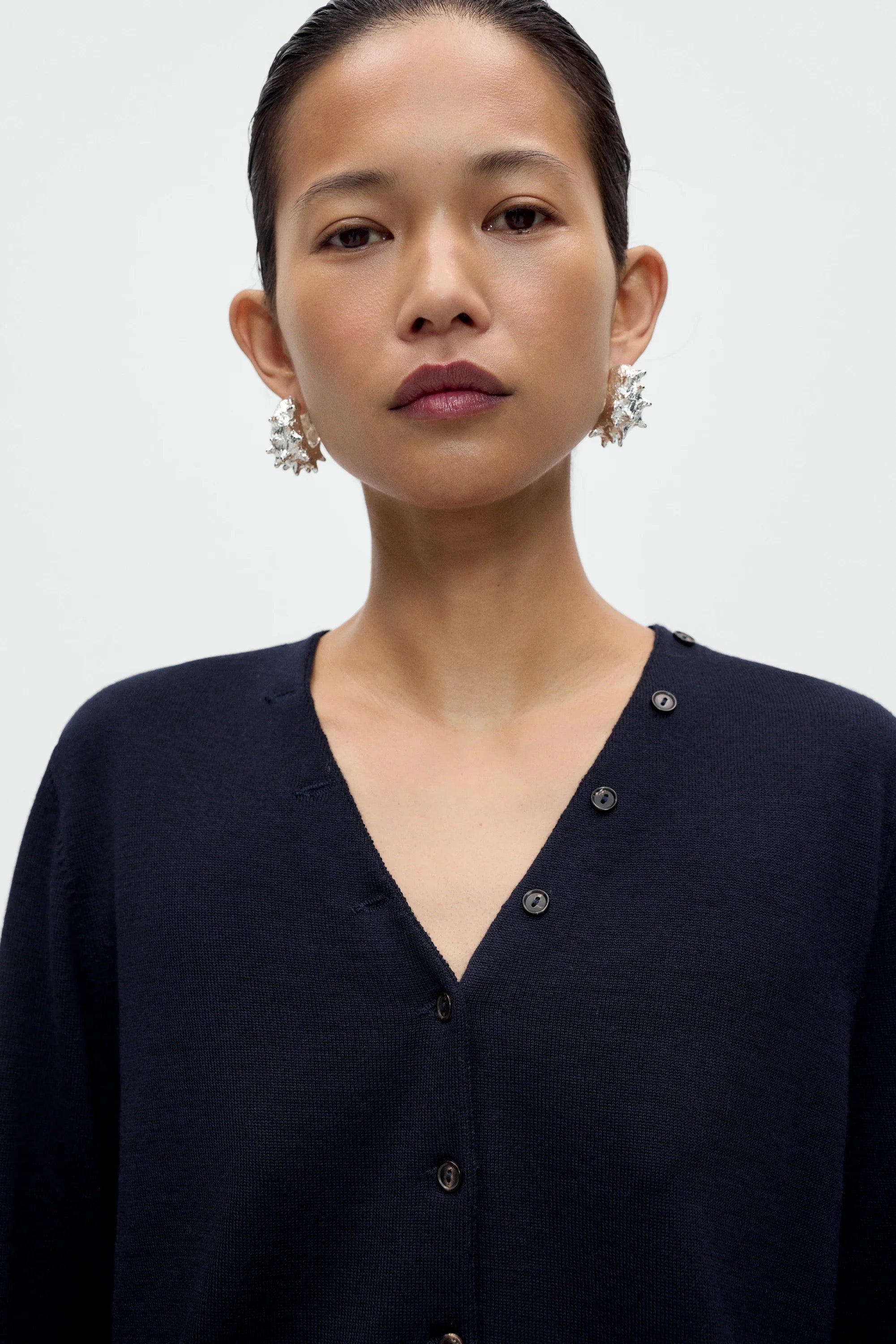 Cordera Merino Wool Button Cardigan neckline and button detail