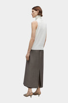 Cordera | Merino Wool Turtleneck Vest In White - SHOP YUCCA Shirts & Tops CORDERA - YUCCA Yucca store Denver, women’s clothing boutique near me, high quality capsule wardrobe, boutiques near me, women’s high quality sweaters