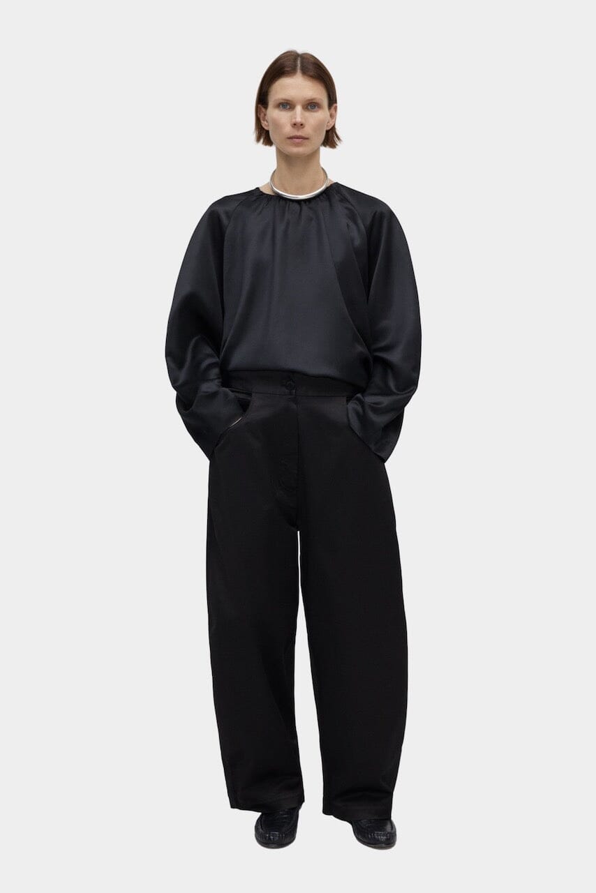 CORDERA | Satin Curved Pants - Black - SHOP YUCCA Bottoms CORDERA- YUCCA Artistic clothing for women, boutique near me, boutique stores near me, cherry creek boutiques, fashion for women over 50