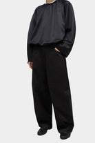CORDERA | Satin Curved Pants - Black - SHOP YUCCA Bottoms CORDERA- YUCCA Artistic clothing for women, boutique near me, boutique stores near me, cherry creek boutiques, fashion for women over 50