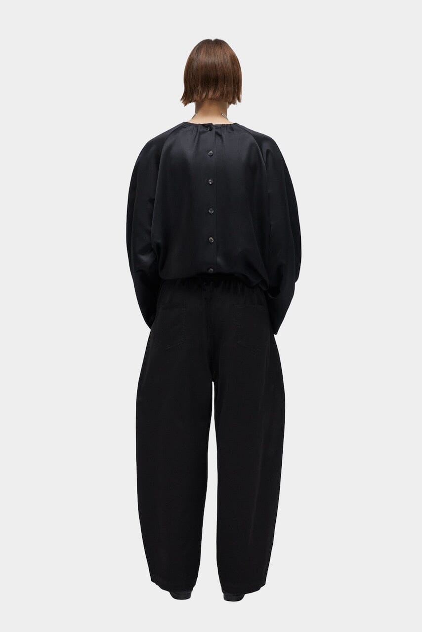 CORDERA | Satin Curved Pants - Black - SHOP YUCCA Bottoms CORDERA- YUCCA Artistic clothing for women, boutique near me, boutique stores near me, cherry creek boutiques, fashion for women over 50