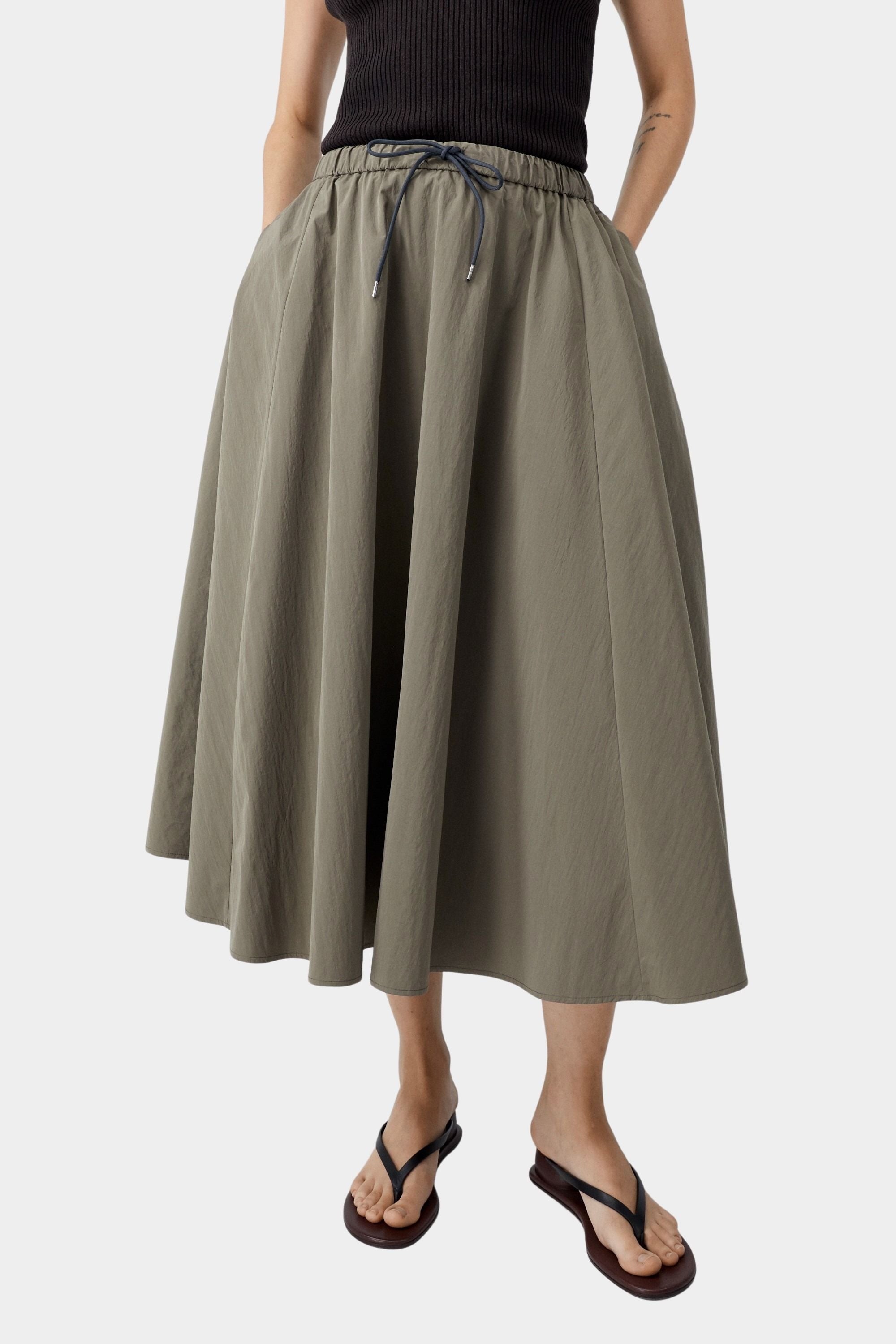 Elastic waist cotton skirt in vetiver green with adjustable drawstring and soft gathered volume