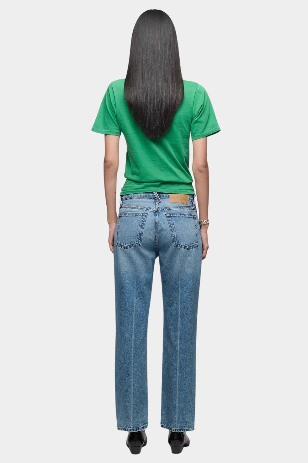DALA Calla mid rise straight ankle jeans in attick blue, back view on model
