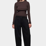 DALA Curve Jeans in One Year Black on model, full front view showing relaxed barrel legs, at YUCCA Denver.