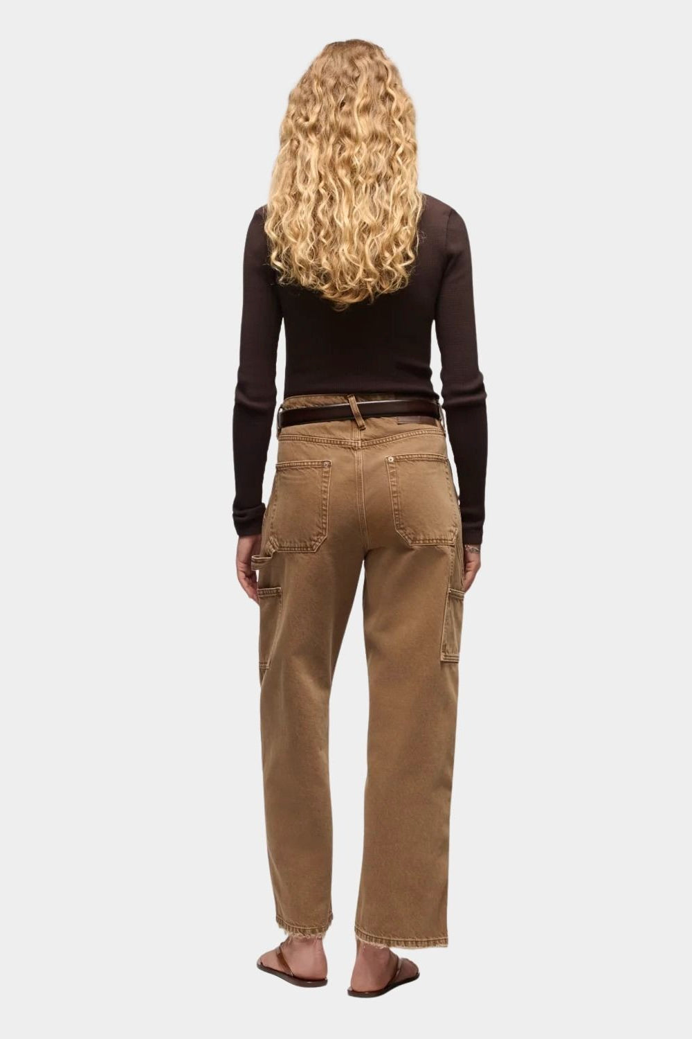 DALA Dove Carpenter Jeans in Oak Brown, back view showing patch pockets, hammer loop and wide straight legs.