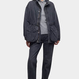 DALA Mountain Jacket in Hurricane, worn open over a gray hoodie with matching denim, from YUCCA Denver.