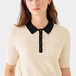 DEMYLEE Celia waffle pointelle cotton polo knit top in ecru with black collar worn on model