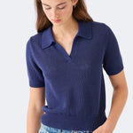 Front view of DEMYLEE Cris indigo cotton linen polo sweater styled with denim