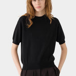 DEMYLEE Irelia Cashmere Top Black front view on model with short raglan sleeves and relaxed fit