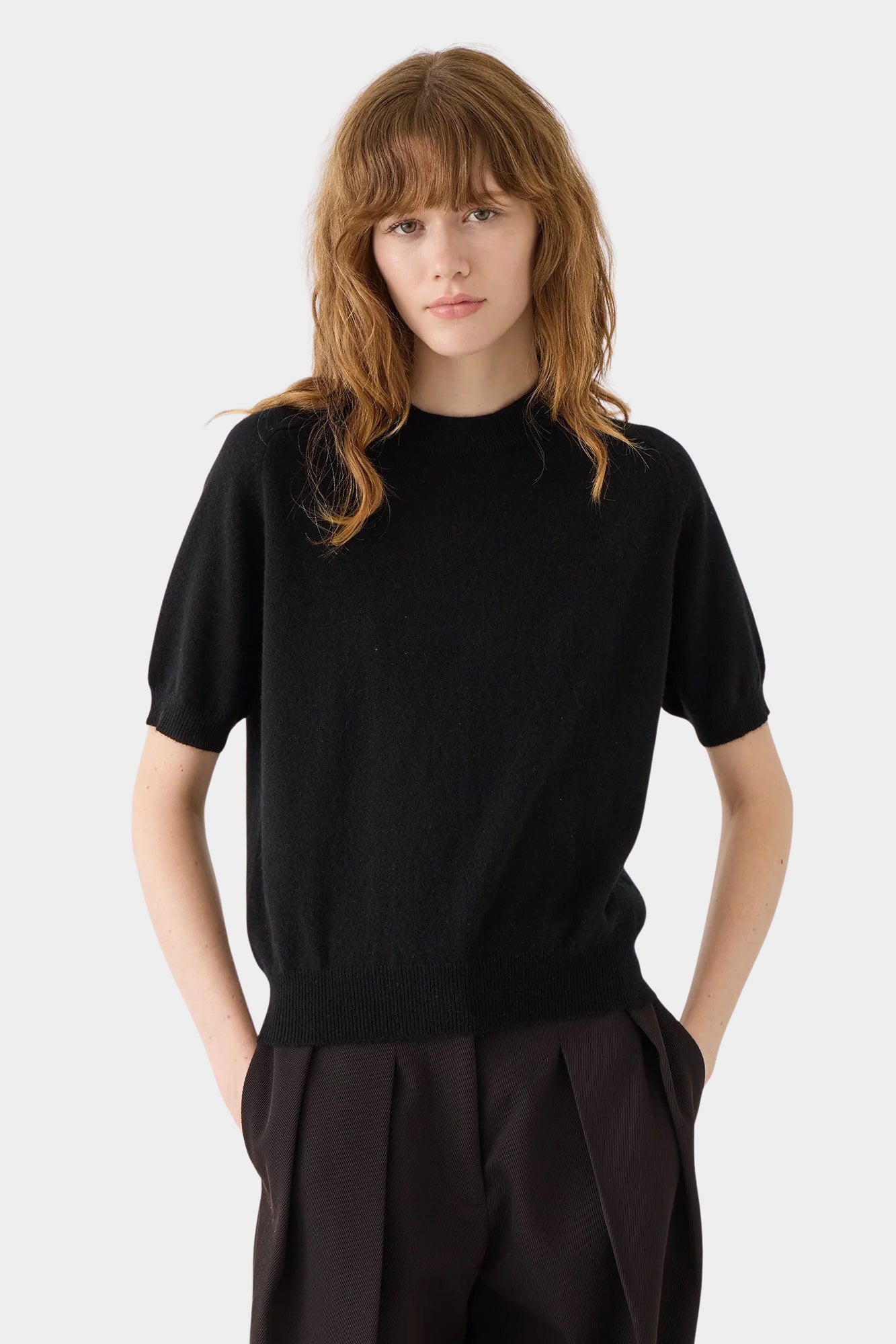 DEMYLEE Irelia Cashmere Top Black front view on model with short raglan sleeves and relaxed fit