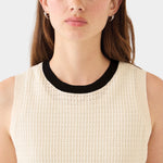 DEMYLEE Issa waffle pointelle cotton sleeveless knit top in ecru with black crewneck trim worn on model