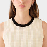 DEMYLEE Issa waffle pointelle cotton sleeveless knit top in ecru with black crewneck trim worn on model
