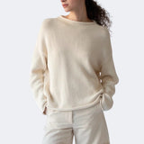 Close view of DEMYLEE Lamis off white cotton sweater showing textured knit and rolled hem detail