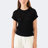 Model wearing DEMYLEE Marlowe black cotton linen knit top with relaxed silhouette and ribbed trim