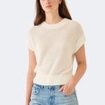 Model wearing DEMYLEE Marlowe off white cotton linen knit top with relaxed fit and ribbed trim