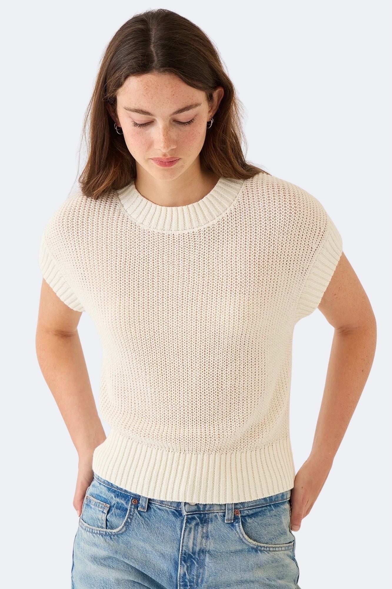Model wearing DEMYLEE Marlowe off white cotton linen knit top with relaxed fit and ribbed trim