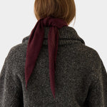 DEMYLEE Nessa Small Cashmere Scarf Garnet tied at the back of the neck