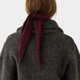 DEMYLEE Nessa Small Cashmere Scarf Garnet tied at the back of the neck