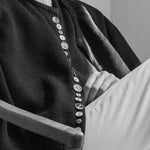 Black DEMYLEE Soleil cotton cardigan styled at YUCCA, an independent women’s boutique in Denver