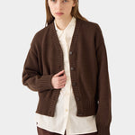 DEMYLEE Vivian Organic Cotton Cardigan Espresso styled over a cream button-down shirt
