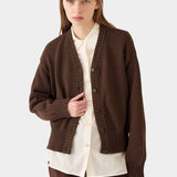 DEMYLEE Vivian Organic Cotton Cardigan Espresso styled over a cream button-down shirt
