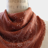 Eco Raw Studio Terracotta Classic Print Naturally Dyed Bandana in Terracotta x White Ink styled on a vintage dress form at YUCCA Denver