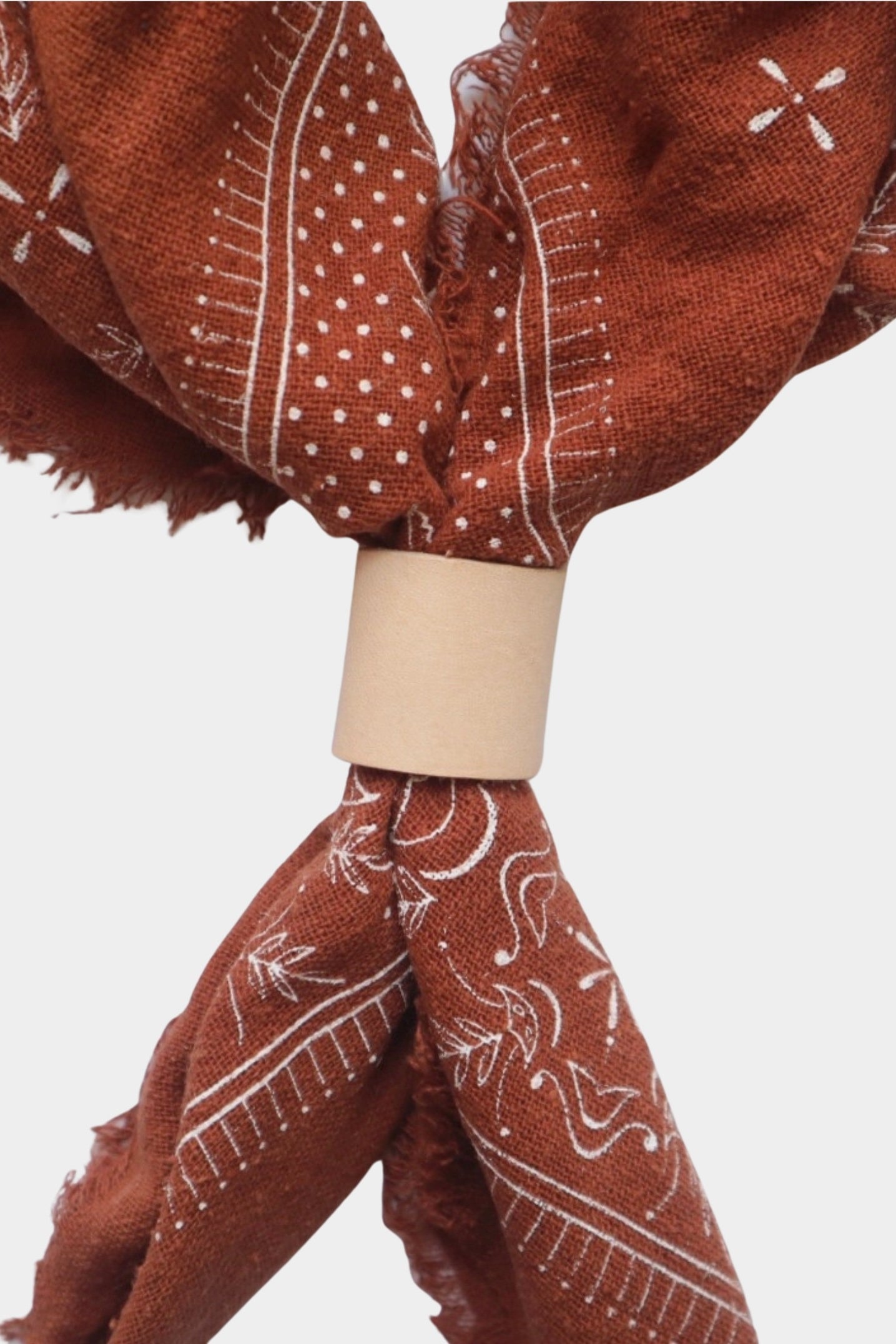 Eco Raw Studio Terracotta Classic Print Naturally Dyed Bandana in Terracotta x White Ink styled with a leather scarf ring