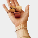 Eco Raw Studio leather bandana cuff light brown worn on wrist styling bandana