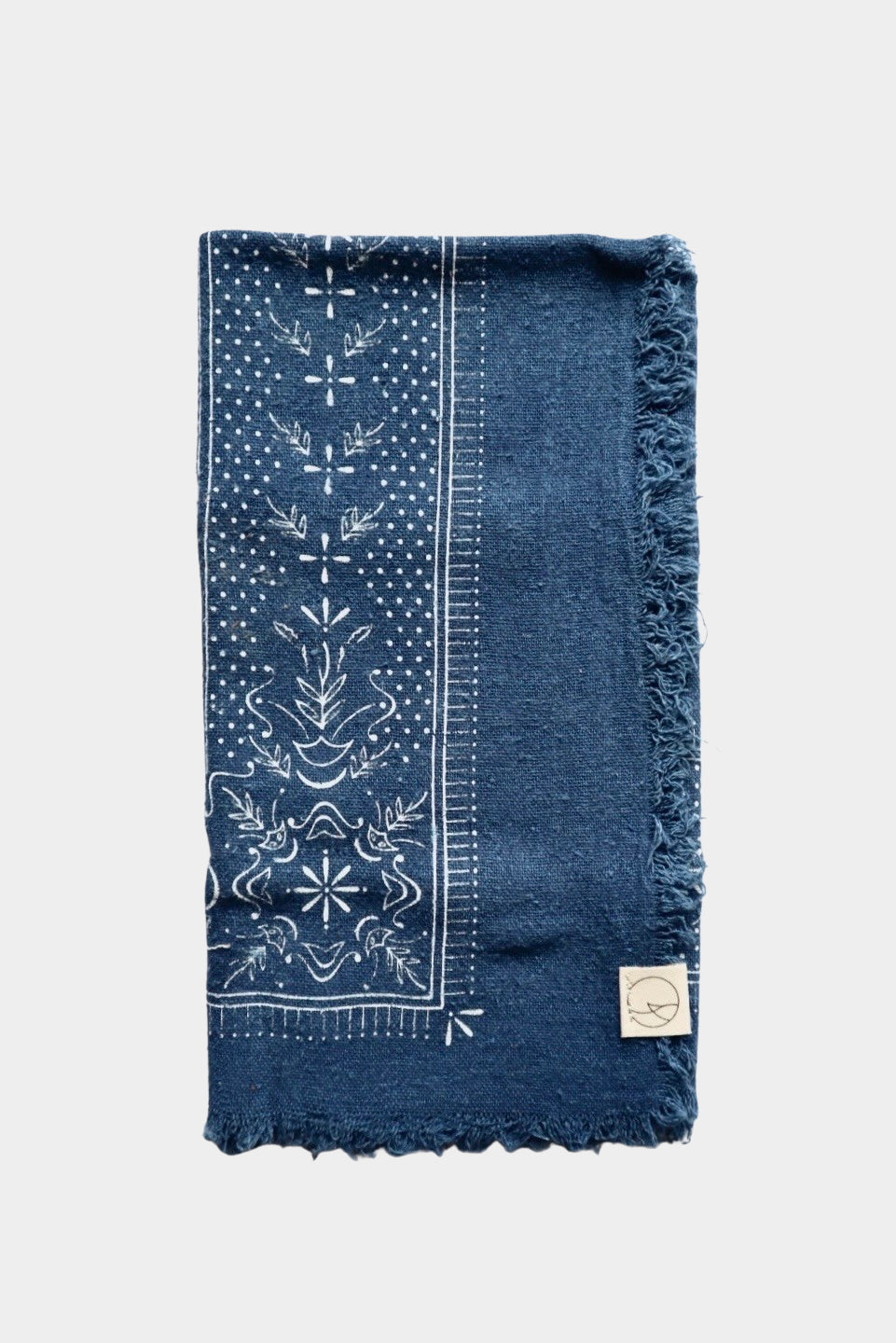 Eco Raw Studio ocean blue raw silk bandana with white print laid flat showing full square shape and border design