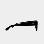 Side profile of Elisa Johnson Rae sunglasses in gloss black acetate with slim temples and tonal black lenses