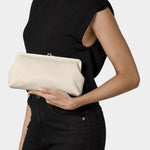IL BISONTE Manuela leather clutch milk worn on model