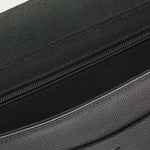 IL BISONTE black leather crossbody bag worn crossbody on model