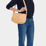 IL BISONTE natural leather crossbody bag worn crossbody on model