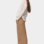 Side view of the Jungmaven Cambria Pant in Coyote showing the drape and wide leg shape at SHOP YUCCA Denver