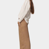 Side view of the Jungmaven Cambria Pant in Coyote showing the drape and wide leg shape at SHOP YUCCA Denver