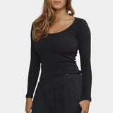 Woman wearing Jungmaven Paseo Long Sleeve Tee in Black, scoop neckline detail