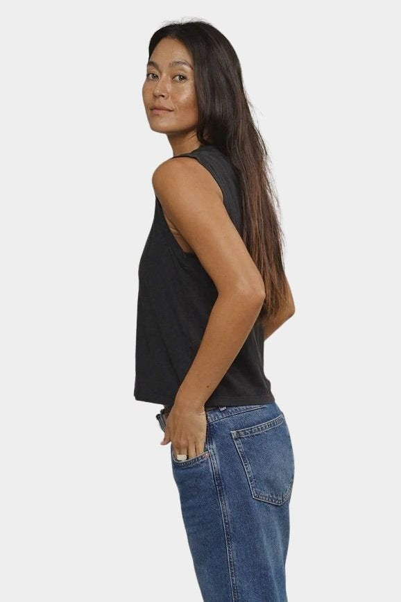 Side view black boxy sleeveless muscle tee with wide armholes