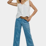 Jungmaven light hemp vest styled with blue denim pants sunglasses front view