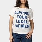 Model wearing the Jungmaven Support Your Local Farmer Ojai Tee in White available at SHOP YUCCA Denver