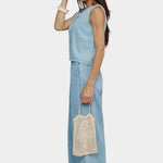 Jungmaven Teton Summer Denim Tank Light side view model wearing cropped boxy denim tank with wide leg pants