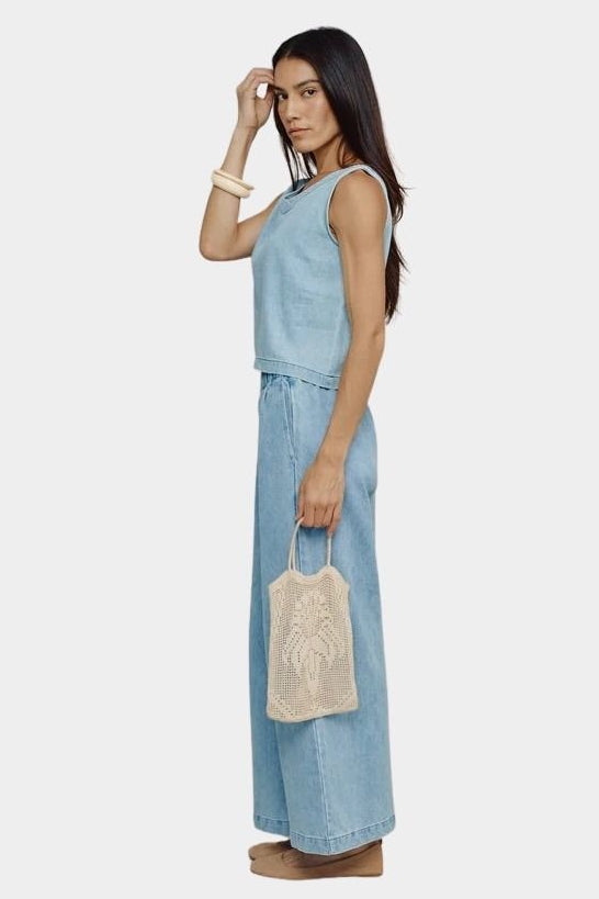 Jungmaven Teton Summer Denim Tank Light side view model wearing cropped boxy denim tank with wide leg pants