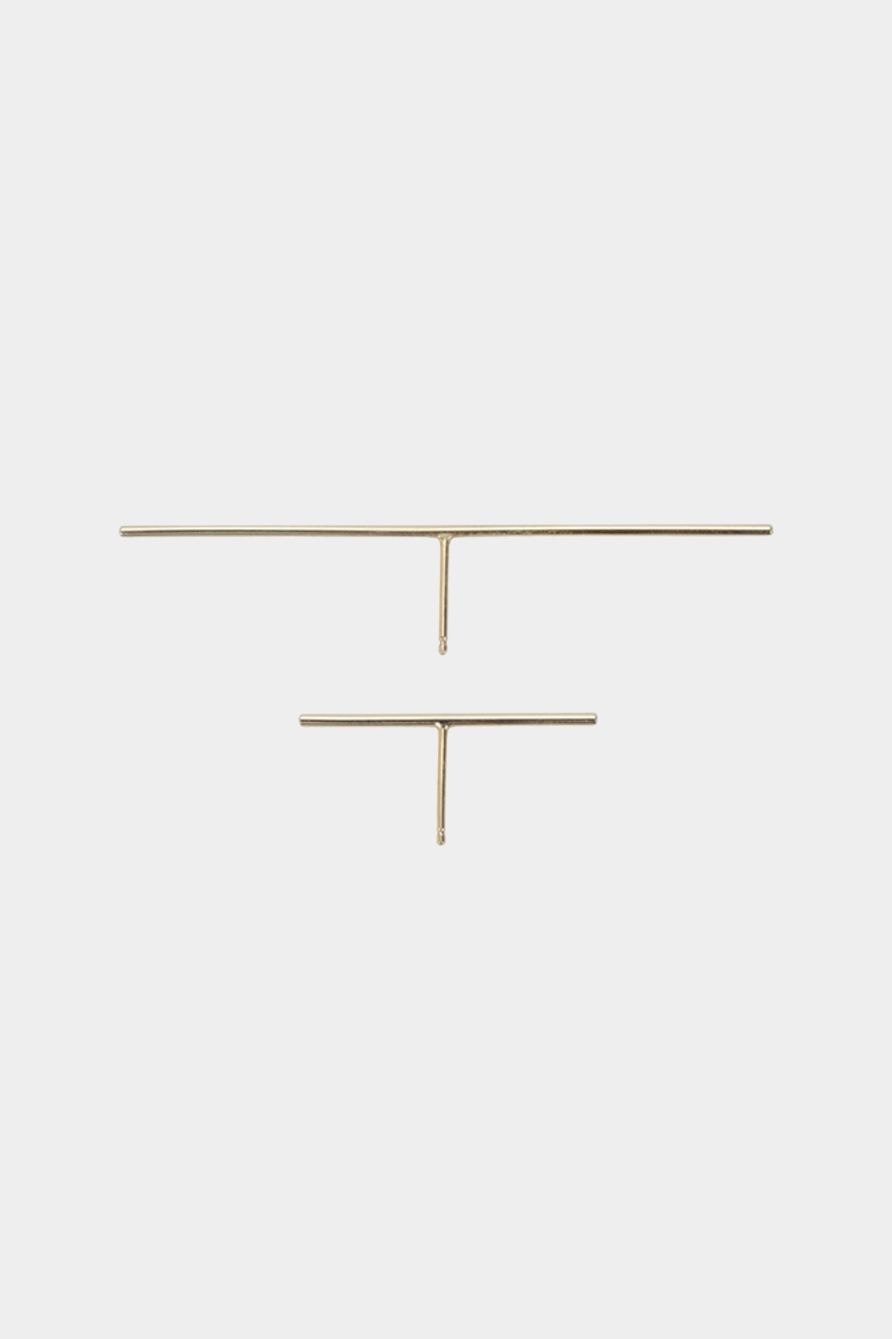 14K gold bar stud earrings with polished finish and post backing.