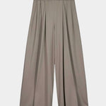 Front product view of the Kowtow Drape Pant in Flint, showing the pleated wide legs and elastic waistband at YUCCA Denver.