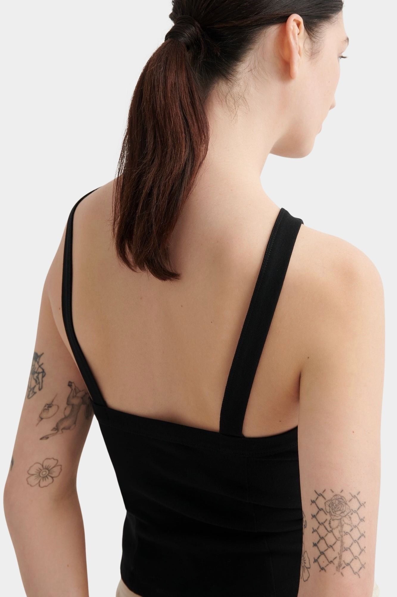 Kowtow Low Back Tank in black, close back view showing low square back and wide straps