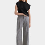 Kowtow Method Tank in black worn with striped wide leg trousers, full length view