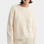 Kowtow chalk organic cotton patchwork jumper close up cable knit detail
