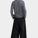kowtow pierre tee uniform stripe navy ivory striped long sleeve tee back view styled with wide leg trousers