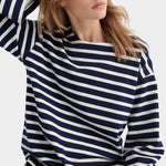 kowtow pierre tee uniform stripe navy and ivory striped organic cotton long sleeve tee close model portrait