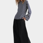 kowtow pierre tee uniform stripe organic cotton striped long sleeve tee relaxed fit worn with wide leg black trousers