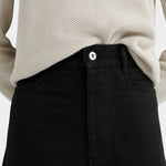 Kowtow Sailor Jeans in black close up showing high rise waist and button closure detail